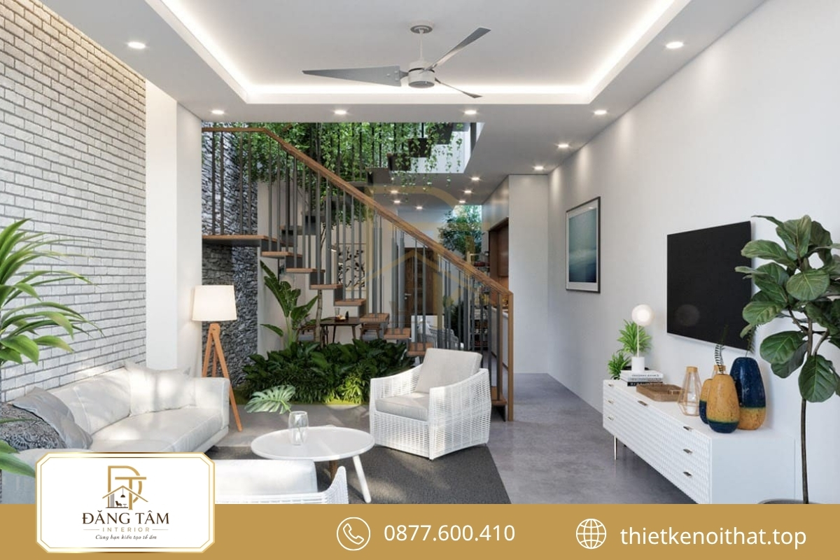 Nội thất tối giản gi&uacute;p cải tạo nh&agrave; ống cũ th&ecirc;m rộng tho&aacute;ng
