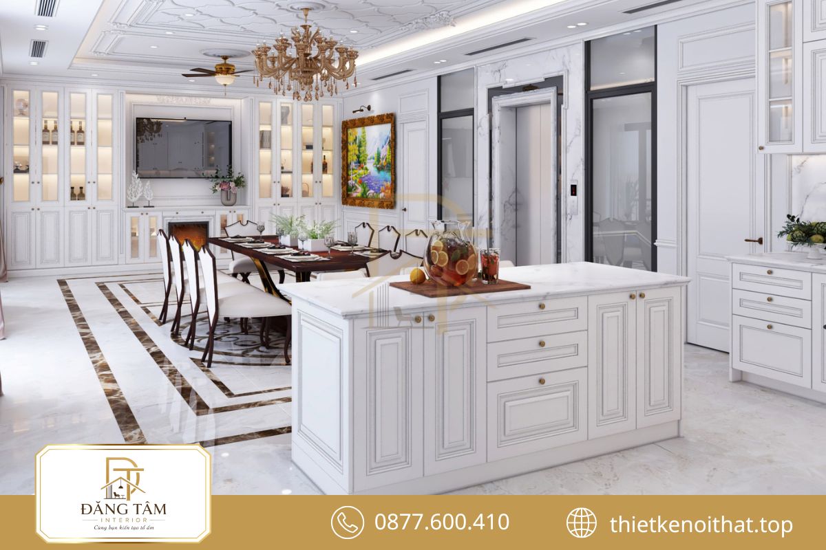 Bếp biệt thự rộng rãi kết nối đảo bếp và bàn ăn thành không gian tiện nghi